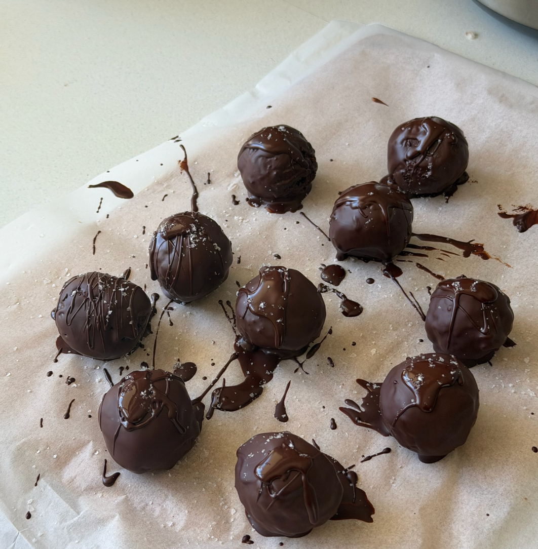 Chocolate-coated peanut butter balls made with Soulistic Bone Broth Cacao Powder